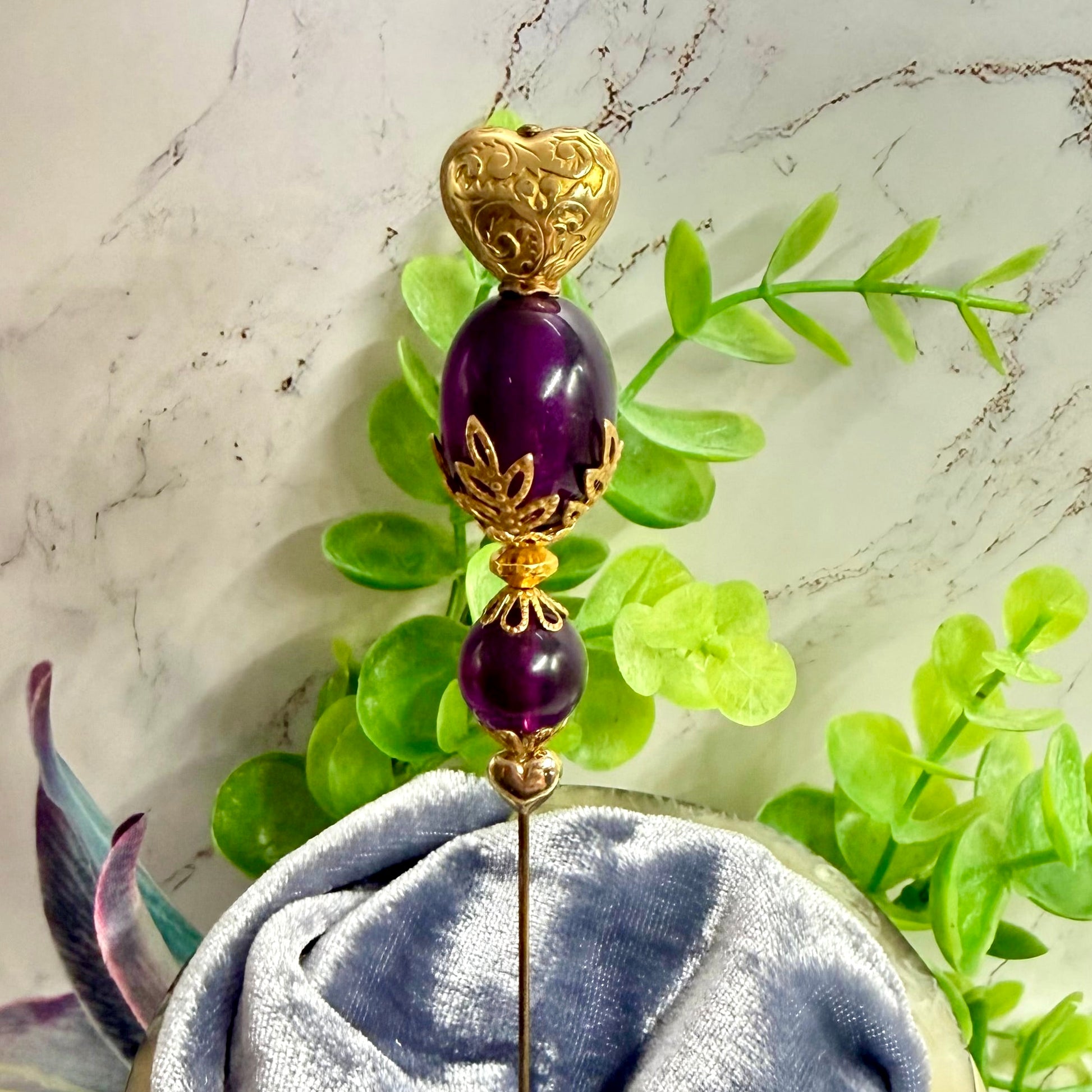 ✨ Handmade Vintage-Inspired Hatpin | Stick Pin | Hat Accessory | Sweater & Hijab Pin | Decorative Jewelry Gift for Her ✨

Deep Purple Class Gold Tone Heart-Shaped Top Finial and Filigree Hatpin • 6 Inch
