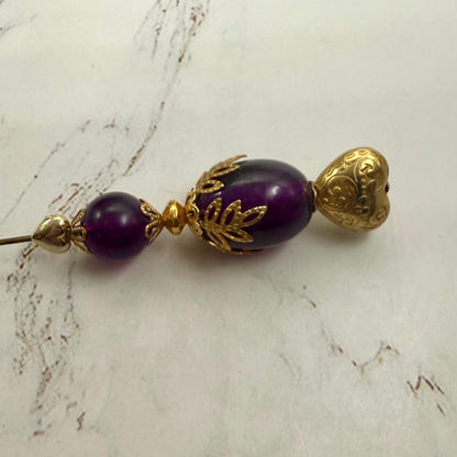 ✨ Handmade Vintage-Inspired Hatpin | Stick Pin | Hat Accessory | Sweater & Hijab Pin | Decorative Jewelry Gift for Her ✨

Deep Purple Class Gold Tone Heart-Shaped Top Finial and Filigree Hatpin • 6 Inch