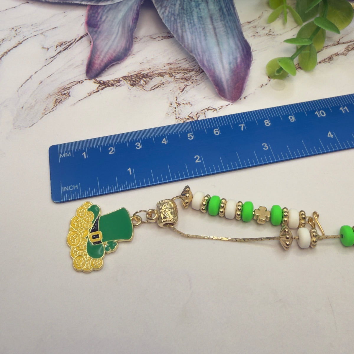 ✨Handmade Doll Jewelry Designed to Fit popular 18 Inch Fashion Dolls: add a touch of “Lucky Irish 🍀” style to your favorite doll!✨

Leprechaun Hat Charm Green White Gold Beaded Doll Necklace