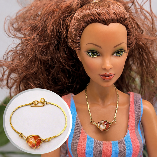 Wire Wrapped Orange White Stone Charm Gold Chain Doll Necklace • Necklace measures 4 1/4 inches long • Necklace shown on 16” Spellbound Valentina doll