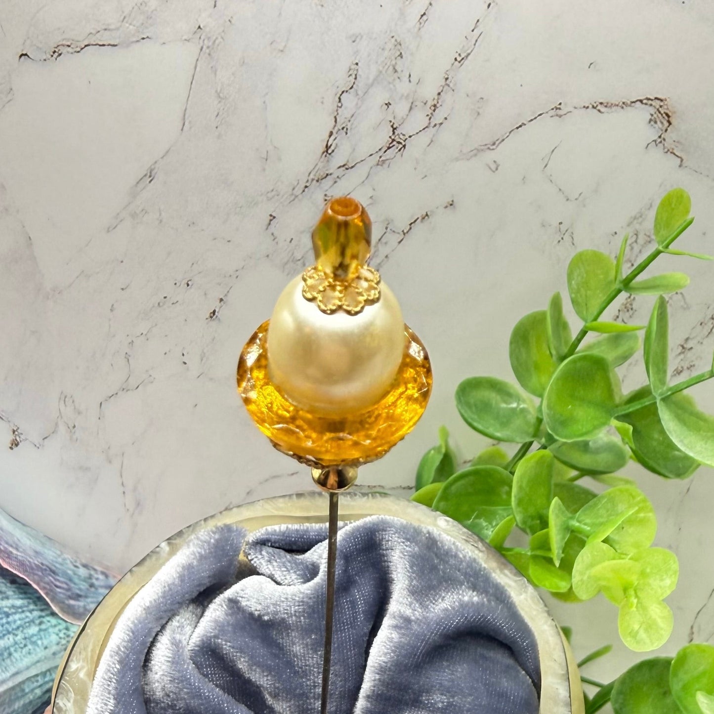 ✨ Handmade Vintage-Inspired Hatpin | Stick Pin | Hat Accessory | Sweater & Hijab Pin | Decorative Jewelry Gift for Her ✨

Yellow Amber Glass Cupped Faux Pearl Gold Tone FiligreeFiligree Accent Hatpin - 7 Inch