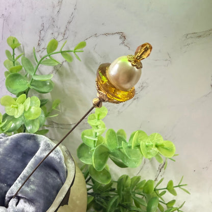 ✨ Handmade Vintage-Inspired Hatpin | Stick Pin | Hat Accessory | Sweater & Hijab Pin | Decorative Jewelry Gift for Her ✨

Yellow Amber Glass Cupped Faux Pearl Gold Tone FiligreeFiligree Accent Hatpin - 7 Inch