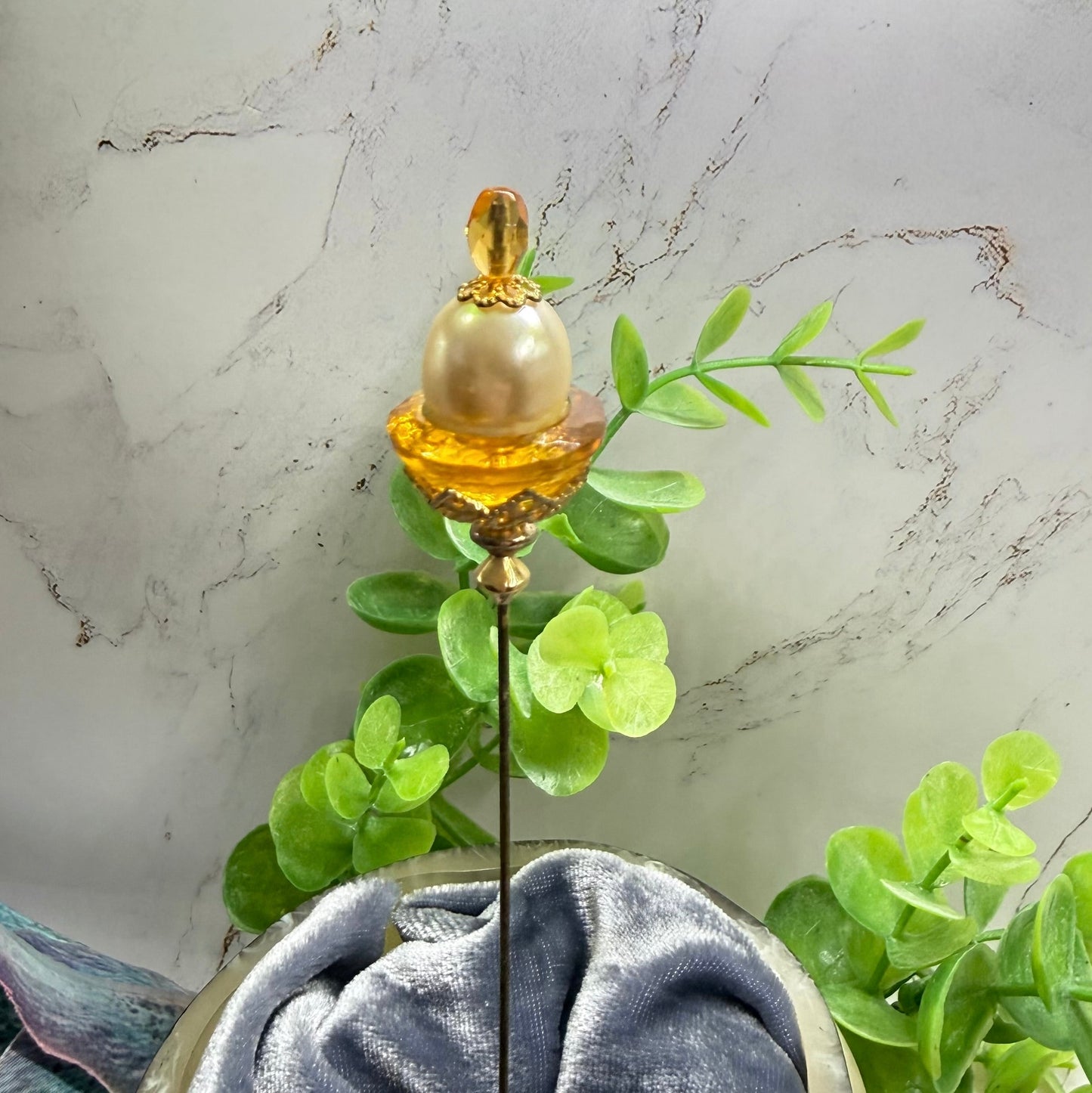 ✨ Handmade Vintage-Inspired Hatpin | Stick Pin | Hat Accessory | Sweater & Hijab Pin | Decorative Jewelry Gift for Her ✨

Yellow Amber Glass Cupped Faux Pearl Gold Tone FiligreeFiligree Accent Hatpin - 7 Inch