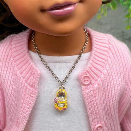 Yellow Marie Jane Shoe Charm w/ Pink Flowers Doll Necklace • necklace measures 6.5 inches long • necklace shown on 18" Journey Girls doll