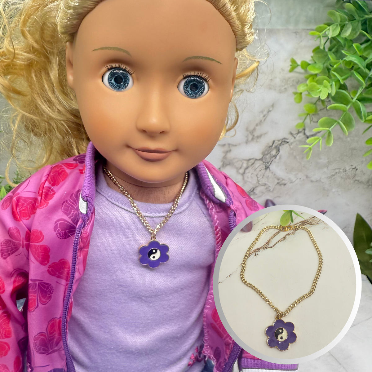 Yin-Yang Purple Flower Charm Gold Chain Doll Necklace. Necklace measures 7 inches long. Necklace shown on 18" Our Generation doll.