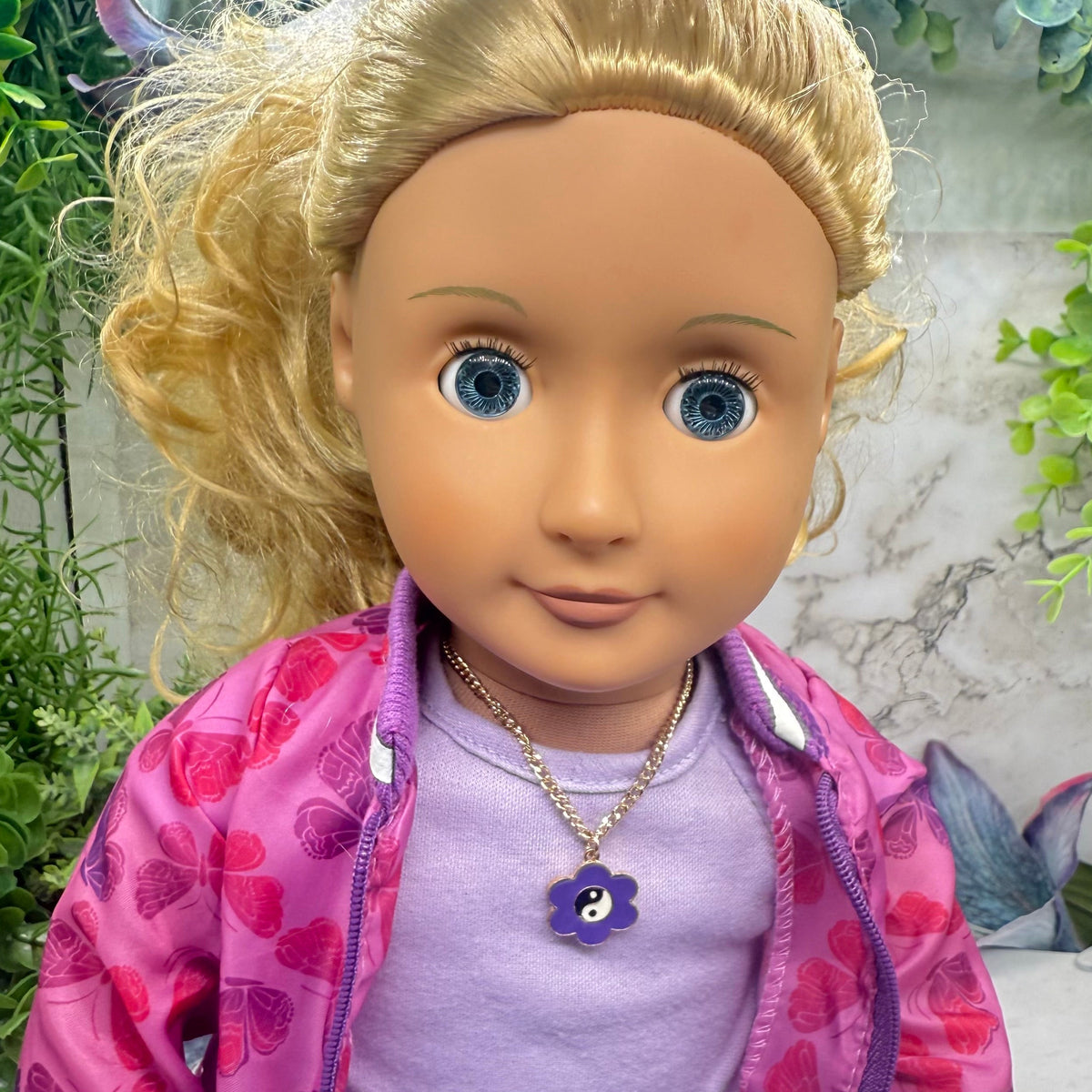 Yin-Yang Purple Flower Charm Gold Chain Doll Necklace. Necklace measures 7 inches long. Necklace shown on 18" Our Generation doll.
